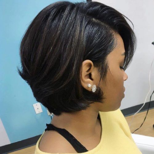 Short Asymmetric Bob Hairstyles With Textured Curls (Photo 7 of 20)