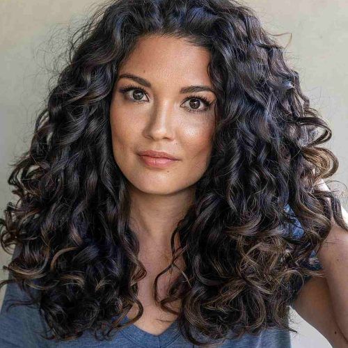 Layered Curly Medium Length Hairstyles (Photo 3 of 20)