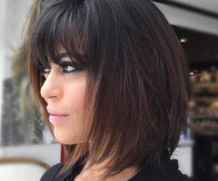 20 Best Brunette Feathered Bob Hairstyles with Piece-y Bangs
