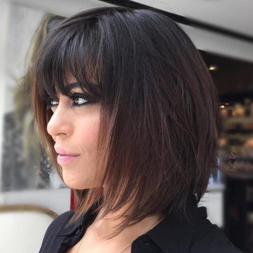Brunette Feathered Bob Hairstyles With Piece-Y Bangs (Photo 1 of 20)