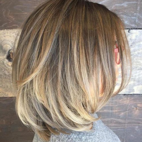 Thick Feathered Blonde Lob Hairstyles (Photo 16 of 20)