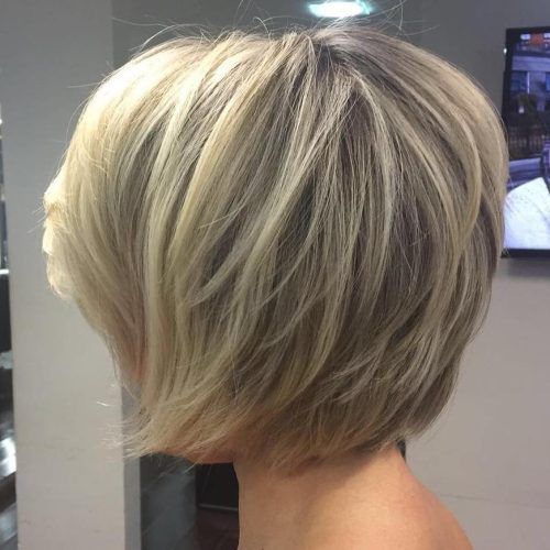 Blonde Pixie Hairstyles With Short Angled Layers (Photo 6 of 20)