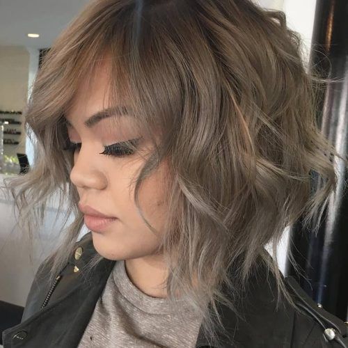 Sophisticated Wavy Ash-Blonde Pixie Bob Hairstyles (Photo 8 of 20)