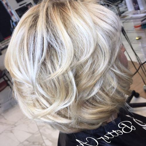Dynamic Tousled Blonde Bob Hairstyles With Dark Underlayer (Photo 18 of 20)