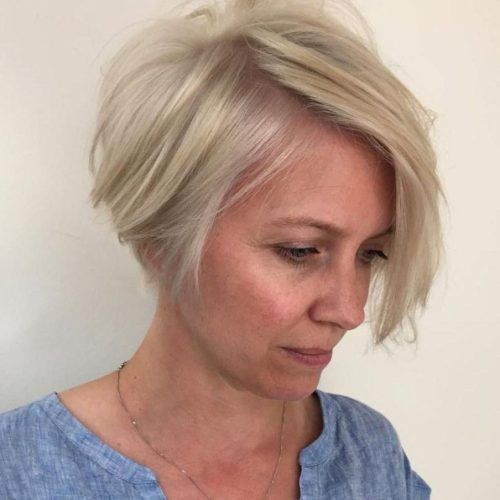 Sophisticated Wavy Ash-Blonde Pixie Bob Hairstyles (Photo 7 of 20)