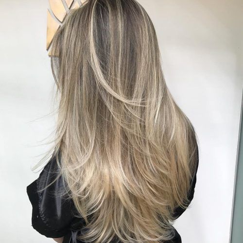 Thick Feathered Blonde Lob Hairstyles (Photo 18 of 20)