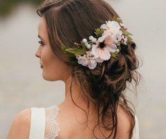 20 Ideas of Curly Wedding Updos with Flower Barrette Ties