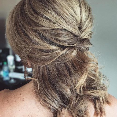 Twisted And Pinned Half Up Wedding Hairstyles (Photo 6 of 20)