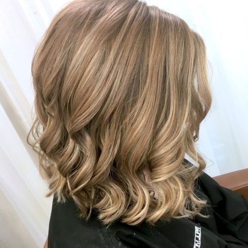 Icy Highlights And Loose Curls Blonde Hairstyles (Photo 2 of 20)