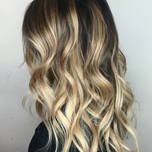 Beachy Waves Hairstyles With Blonde Highlights (Photo 20 of 20)