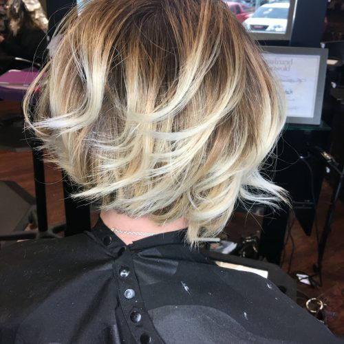 Pearl Blonde Bouncy Waves Hairstyles (Photo 5 of 20)