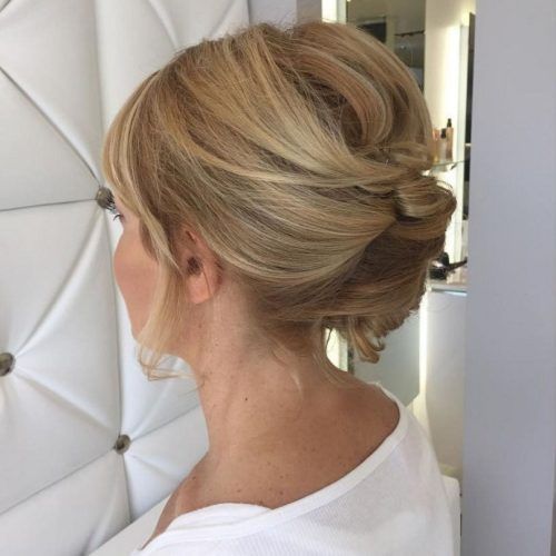 Messy French Roll Bridal Hairstyles (Photo 8 of 20)