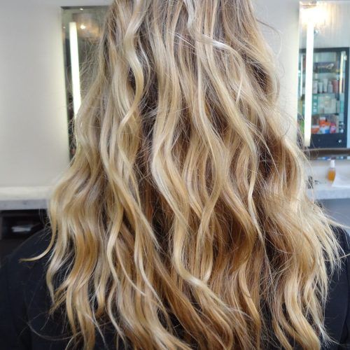 Salty Beach Blonde Layers Hairstyles (Photo 3 of 20)