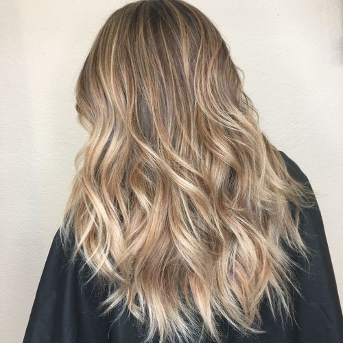 Creamy Blonde Waves With Bangs (Photo 4 of 20)