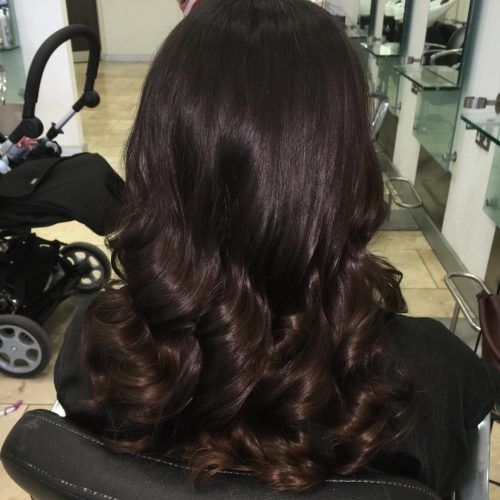 Deep Chocolate Curls Hairstyles With High Contrast Highlights (Photo 8 of 20)