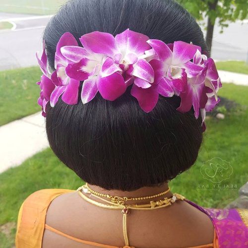 Floral Bun Updo Hairstyles (Photo 6 of 20)