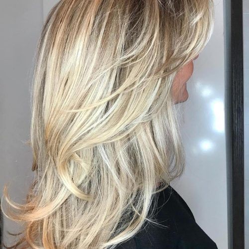 Multi-Tonal Mid Length Blonde Hairstyles (Photo 10 of 20)