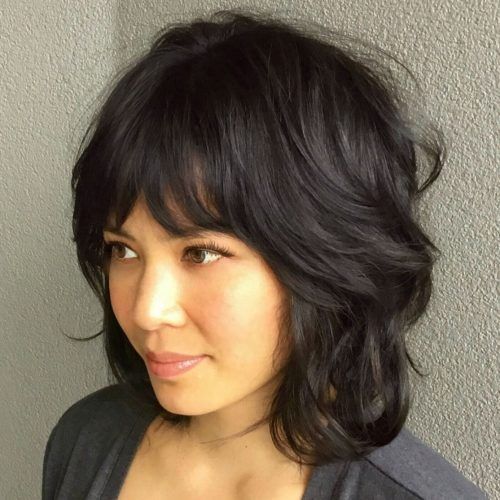 Choppy Shag Hairstyles With Short Feathered Bangs (Photo 4 of 20)