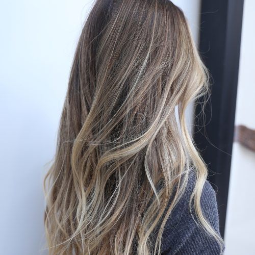 Beachy Waves Hairstyles With Blonde Highlights (Photo 17 of 20)