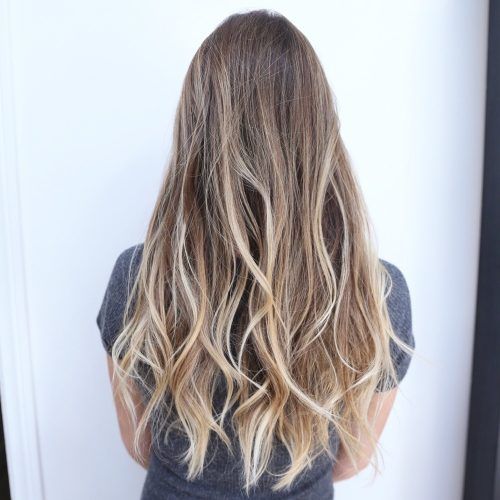 Beachy Waves Hairstyles With Blonde Highlights (Photo 11 of 20)