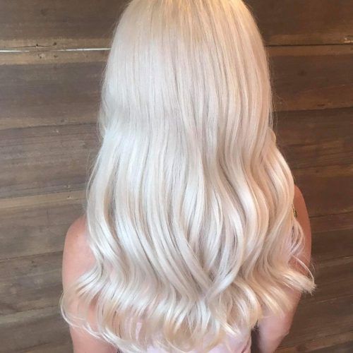 Creamy Blonde Waves With Bangs (Photo 1 of 20)
