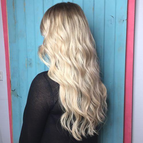 Creamy Blonde Waves With Bangs (Photo 9 of 20)