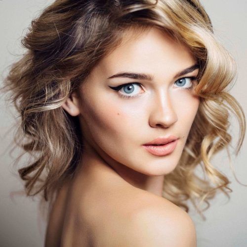 Sleek Blonde Hairstyles With Grown Out Roots (Photo 18 of 20)