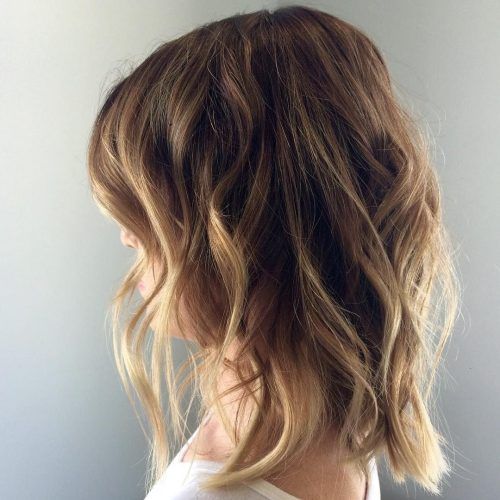 Beachy Waves Hairstyles With Blonde Highlights (Photo 9 of 20)