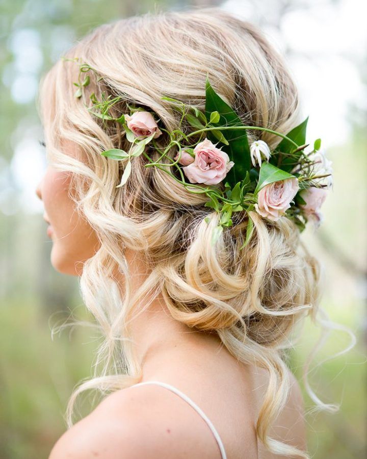 20 Photos Romantic Florals Updo Hairstyles