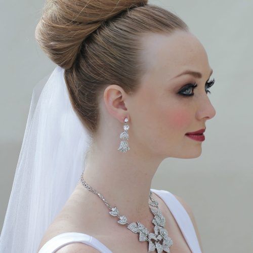 Bridal Bun Updo Hairstyles (Photo 13 of 15)