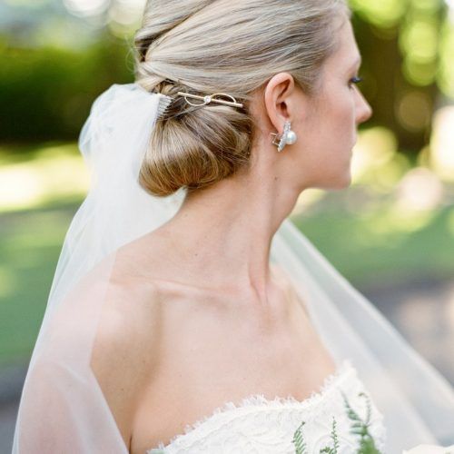 Classic Twists And Waves Bridal Hairstyles (Photo 5 of 20)