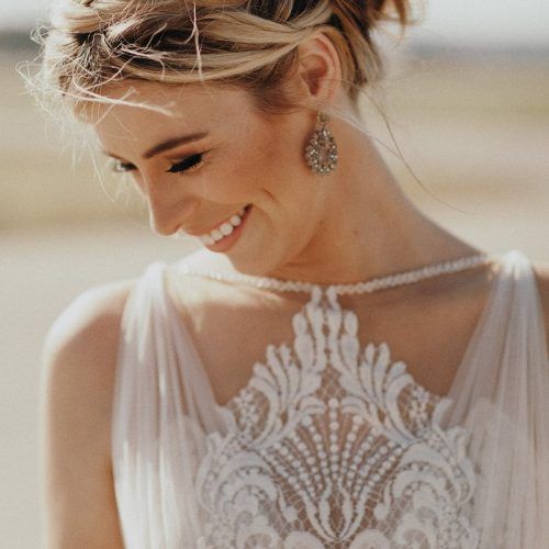 Bohemian Curls Bridal Hairstyles With Floral Clip (Photo 10 of 20)