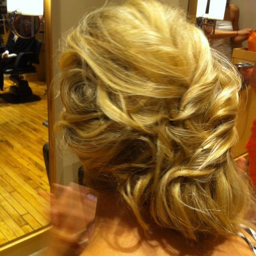 Twisted And Pinned Half Up Wedding Hairstyles (Photo 15 of 20)