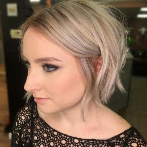 Choppy Pixie Haircuts With Blonde Highlights (Photo 17 of 20)