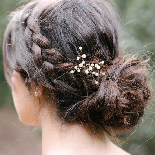Sleek Bridal Hairstyles With Floral Barrette (Photo 18 of 20)