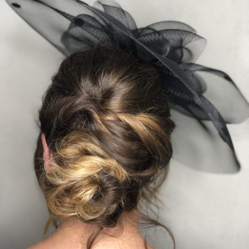 Side Bun Prom Hairstyles With Black Feathers (Photo 9 of 20)