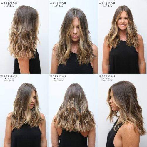 Sun-Kissed Blonde Hairstyles With Sweeping Layers (Photo 13 of 20)