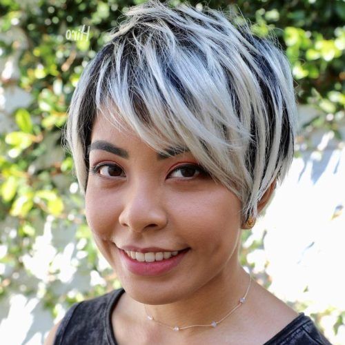 Dark Pixie Haircuts With Blonde Highlights (Photo 6 of 20)