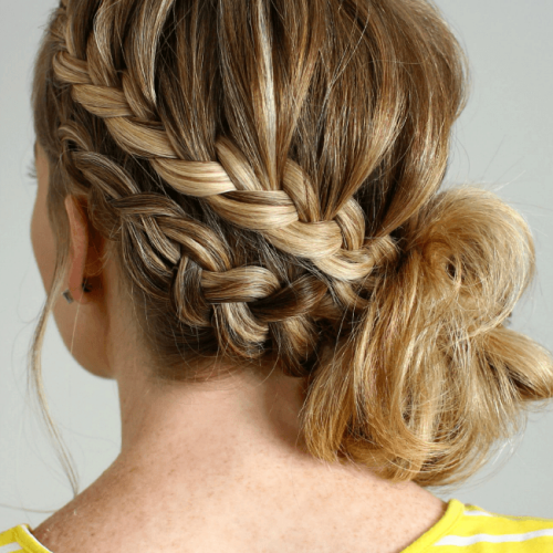 Low Braided Bun With A Side Braid (Photo 8 of 15)