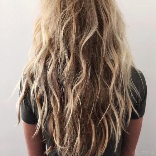 Salty Beach Blonde Layers Hairstyles (Photo 5 of 20)
