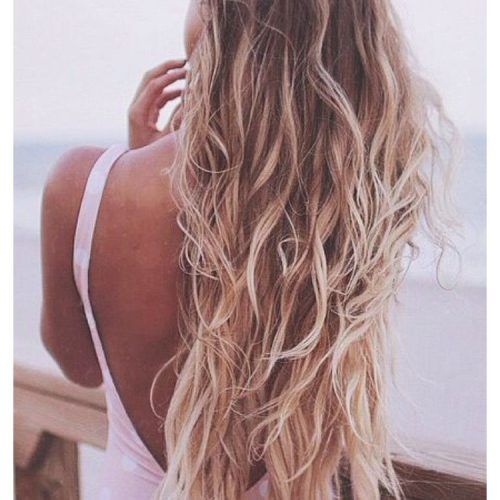Salty Beach Blonde Layers Hairstyles (Photo 6 of 20)