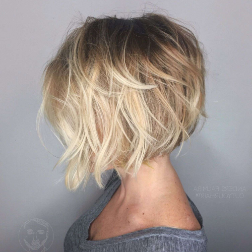 Curly Angled Blonde Bob Hairstyles (Photo 19 of 20)