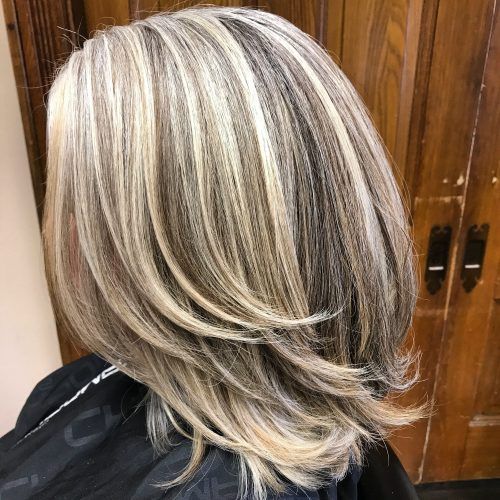 Dynamic Tousled Blonde Bob Hairstyles With Dark Underlayer (Photo 14 of 20)