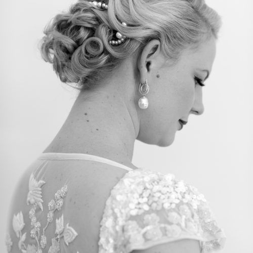 Chignon Wedding Hairstyles With Pinned Up Embellishment (Photo 9 of 20)