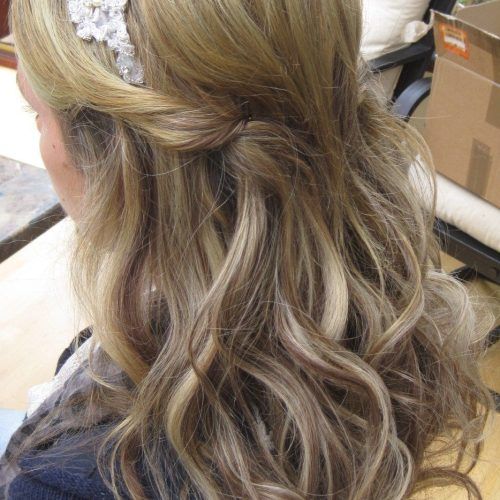 Half Up Wedding Hairstyles With Jeweled Clip (Photo 5 of 20)