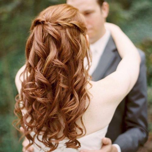 Medium Half Up Half Down Bridal Hairstyles With Fancy Knots (Photo 19 of 20)