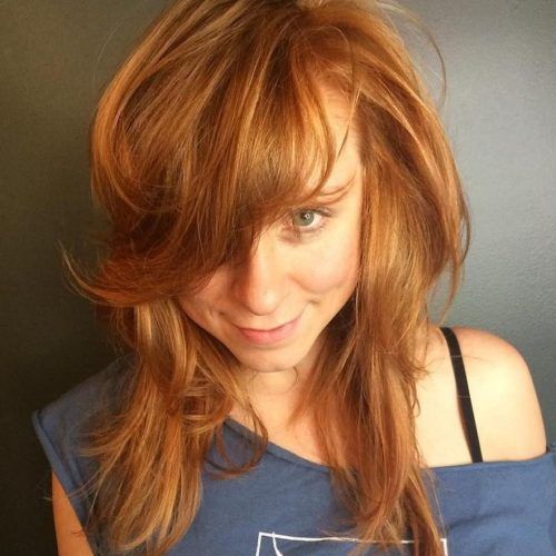 Asymmetrical Copper Feathered Bangs Hairstyles (Photo 4 of 20)