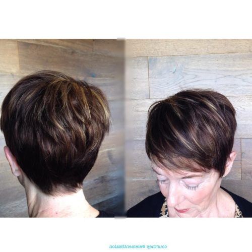 Short Side Swept Pixie Haircuts With Caramel Highlights (Photo 12 of 20)
