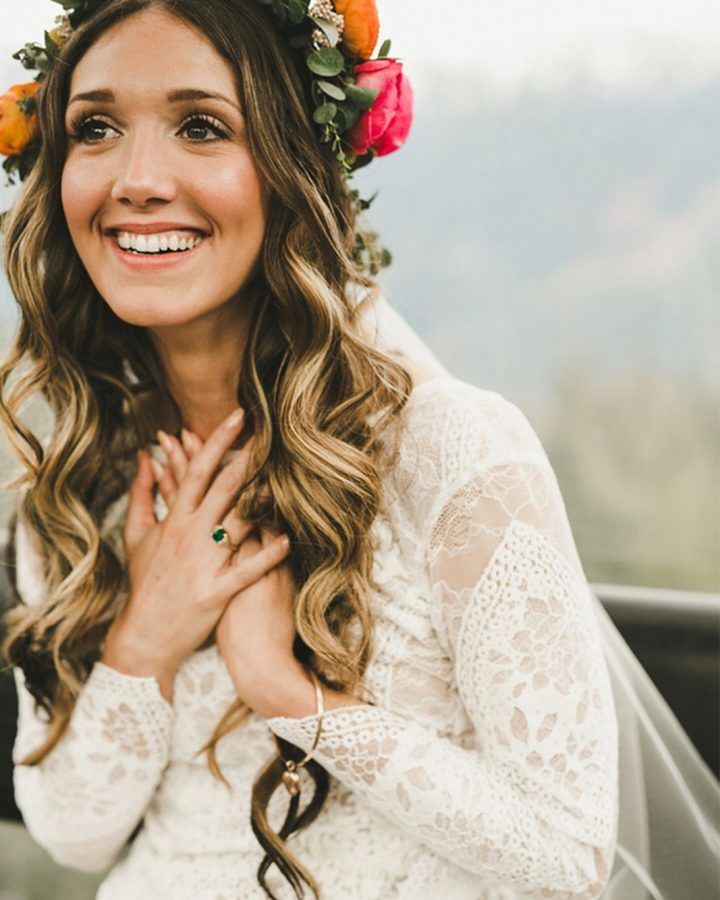 20 Ideas of Bohemian Curls Bridal Hairstyles with Floral Clip