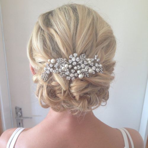 Pulled Back Half Updo Bridal Hairstyles With Comb (Photo 13 of 20)